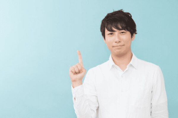 指さす人