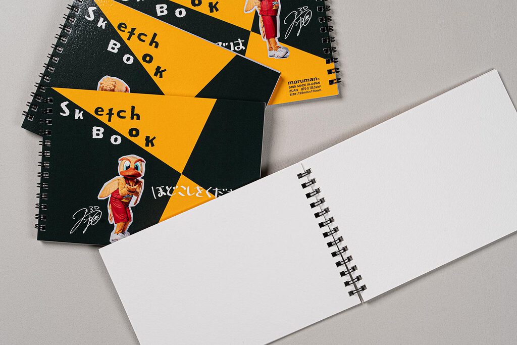 制作事例】公式試合ノベルティスケッチブック - 株式会社フェニックス