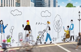 人々の暮らしをイラストにした屋外の仮囲い