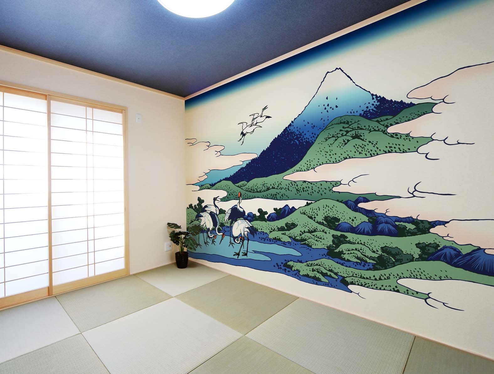 鶴と富士山のイラストの壁紙が貼られた和室