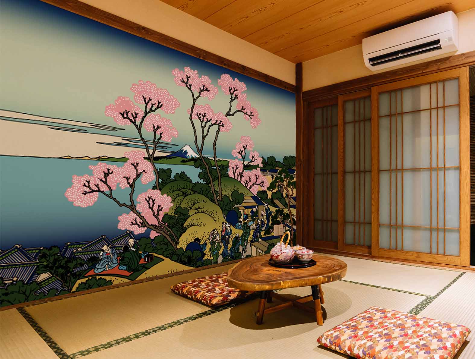 桜が咲いている村のイラストの壁紙が貼られた客室