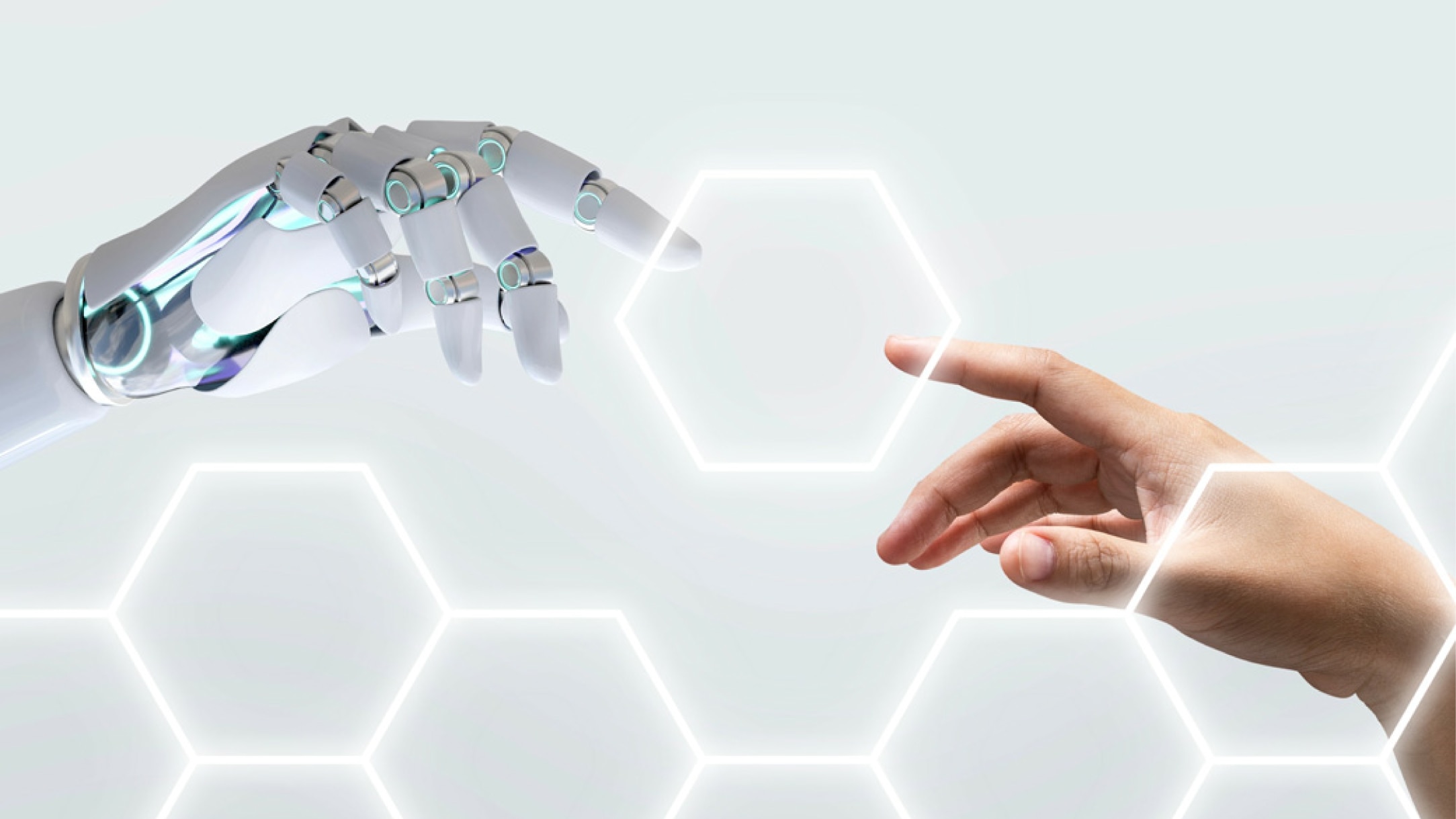 人間とロボットの手元の写真